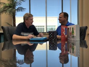 J & J Printing_Discussing heavyweight board options with customer