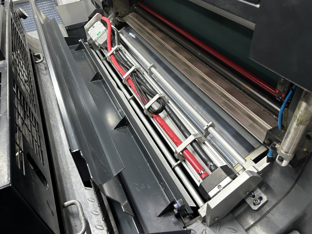 The pictures show LeoLED being installed on a Heidelberg CX102.