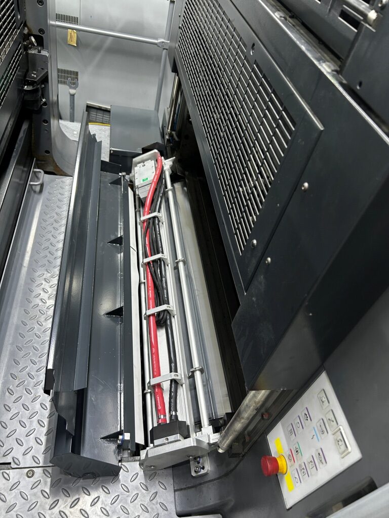 The pictures show LeoLED being installed on a Heidelberg CX102.
